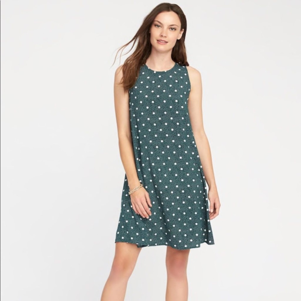 Green polka dot swing dress